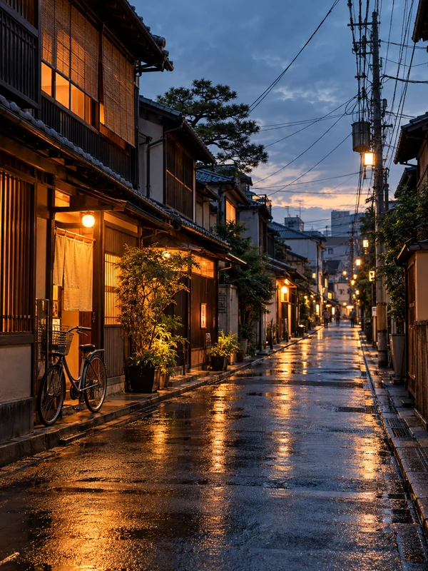 Quiet Japanese street with warm window light after rain
